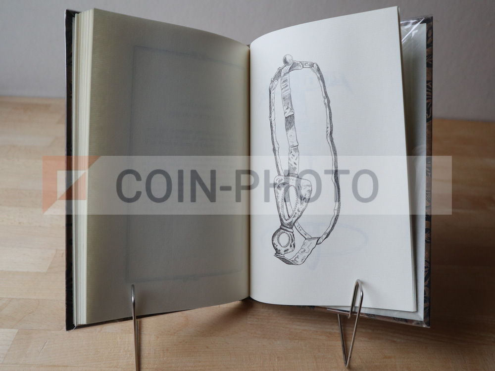 Double page intérieure montrant le papier vergé, la typographie soignée et la justification du tirage numéroté